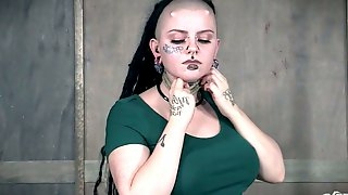 Tattooed goth Luna LaVey is restrained and punished in the BDSM room