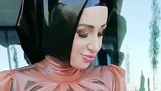 Muslima walking in latex outside ( compilation )